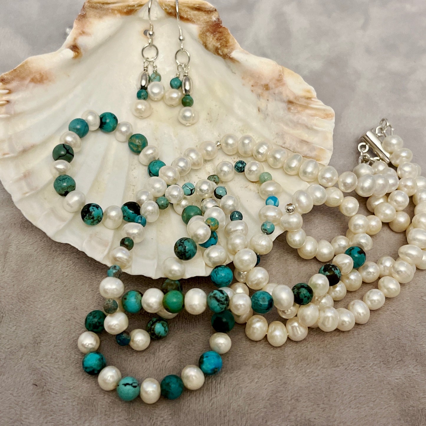 Double stranded cultured pearl and turquoise necklace and earrings set.