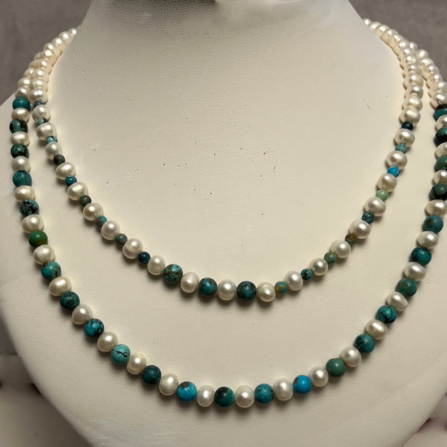 Double stranded cultured pearl and turquoise necklace and earrings set.